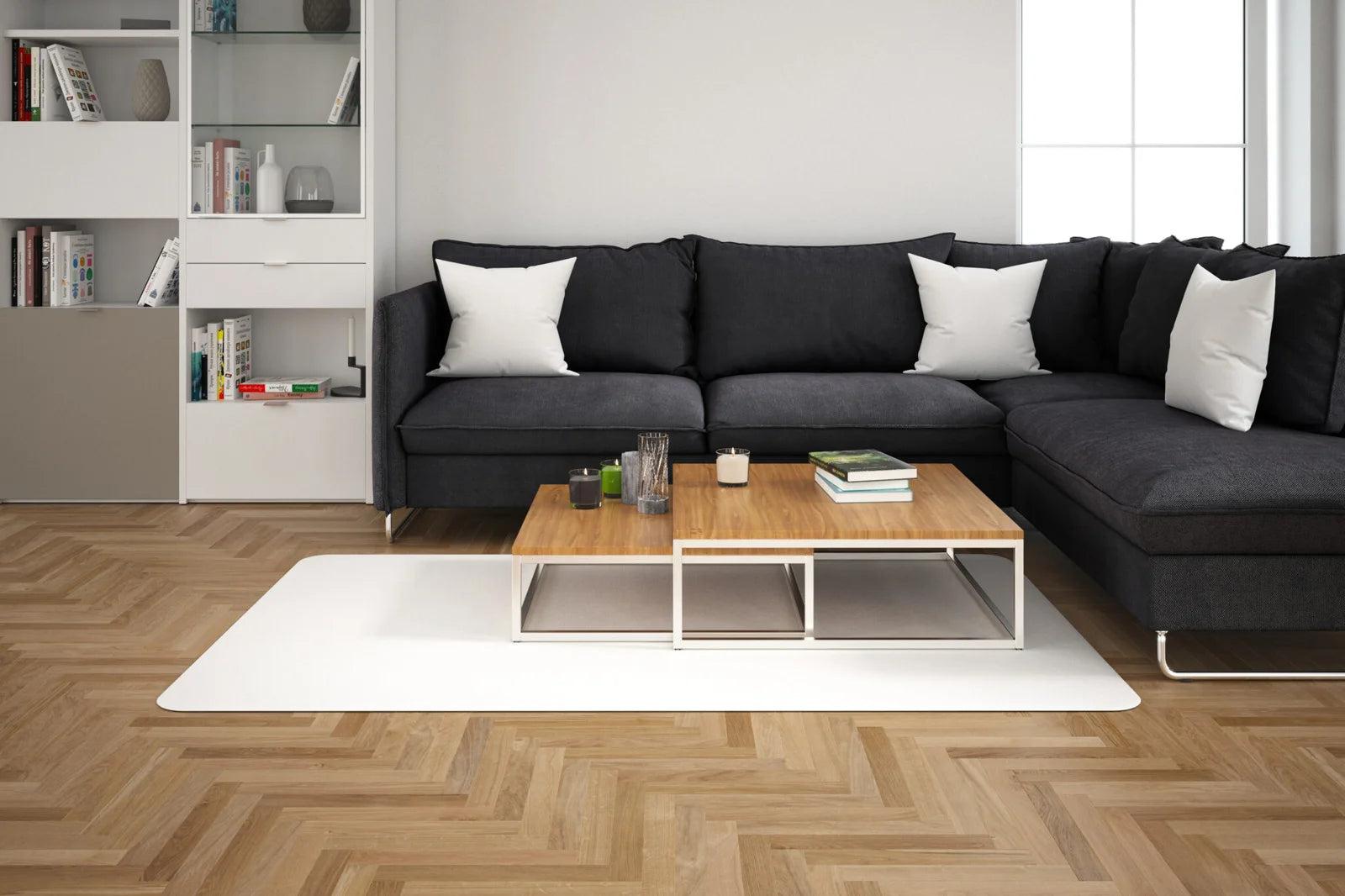 Modern living room with a white rug, black sectional sofa, and wooden coffee table.